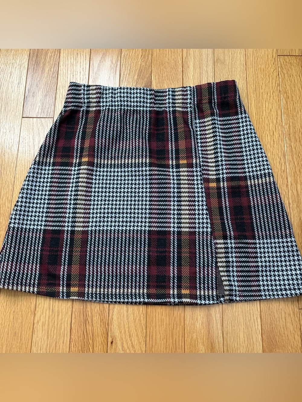 Abound red, black, and yellow plaid stretchy miniskirt!